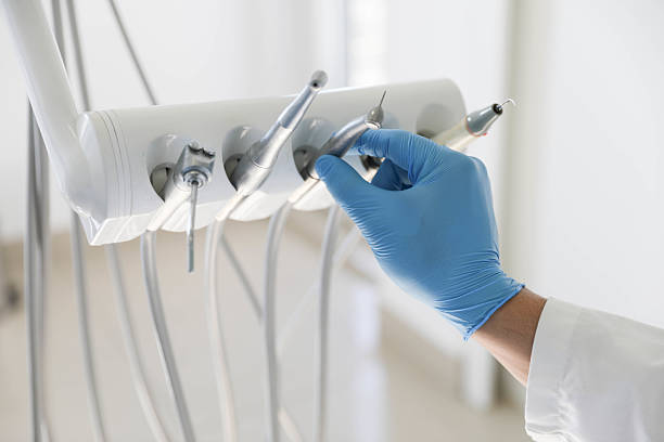 Professional Tooth Extraction technician working in Charlotte, TX